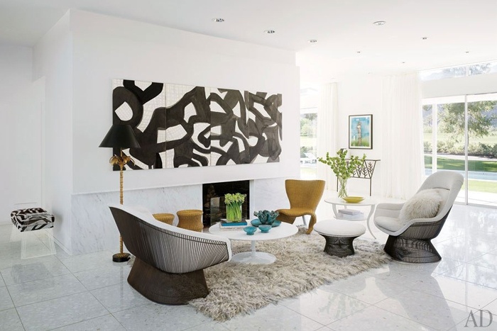 Porter Teleo Tangled on cabinet doors conceal a television and become art. Architectural Digest. Photo: Nikolas Koenig